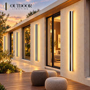 Vista Long Strip wall light illuminating an evening exterior